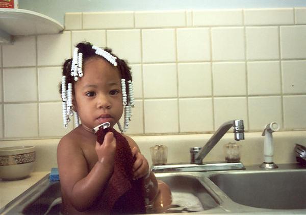 Toddler in sink