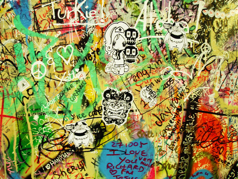 Stickers on Grafitti Wall