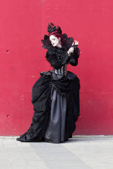 Stock - Gothic woman vampire red wall pose 3