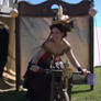 Stock - Steampunk lady riding a bike .. smile