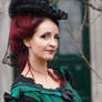 Stock - Victorian Lady green gown smile sideview