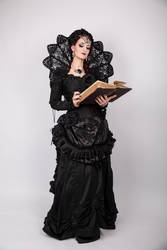 Stock - Gothic woman book reading pose smile 2