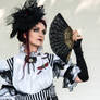 Stock - Burton lady with fan stirped dress 3