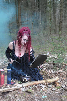 Stock - Bellatrix look into a book magic pose