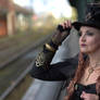 Stock - Steampunk woman portrait hat pose