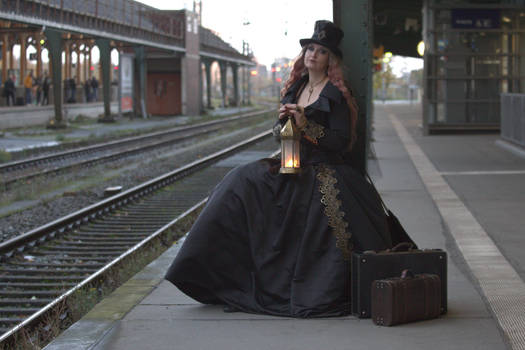 Stock - Steampunk woman  sitting lantern station
