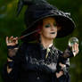 Stock - Smiling witch doing magic portrait gothic