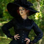 Stock - Gothic lady strong pose stand big hat goth