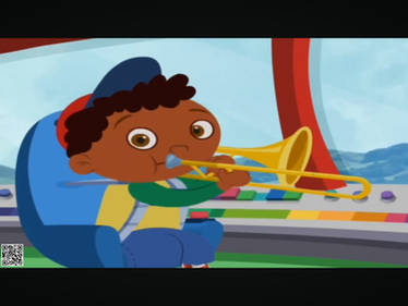 Quincy Blowing A Trombone