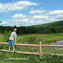 Boy overlooking field