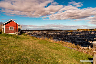 House by Rapids at Kukkolaforsen, Sweden