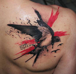 Swallow tattoo