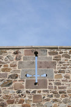 Inverted cross in stone