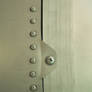 Metal texture with rivets
