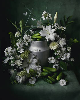 Still life with cucumbers and white flowers