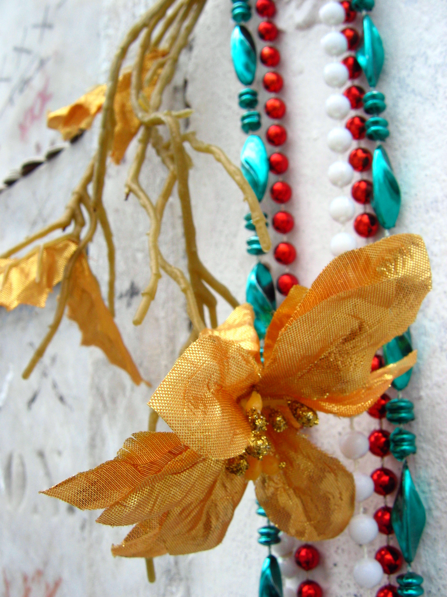 Flowers and Beads on a Grave