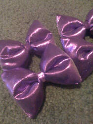 Purple puffy bows