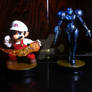 Fire Mario and Dark Samus Amiibo