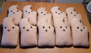 Ten toast plush for Bitten Toast Games.