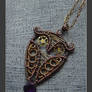 Gear eyed owl pendant