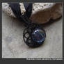 Blue-black moon pendant