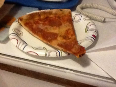 THE BIGGEST PIZZA SLICE KNOWN TO MAN KIND.