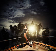 Young sexy woman on her yacht at sunset