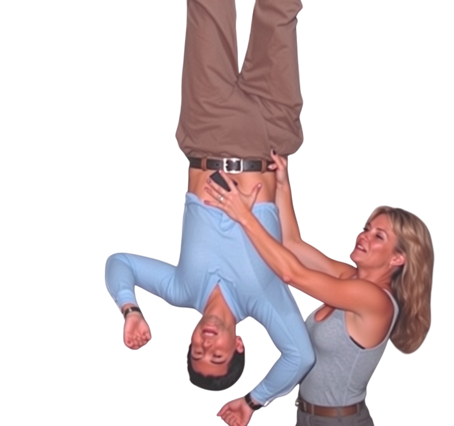 Muscle Woman Lifting Man By Back Of His Belt