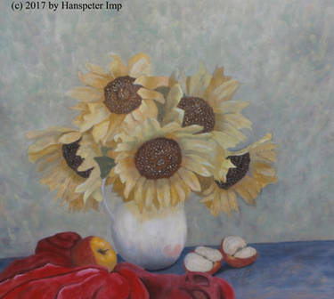 Sun flowers in a vase with apples and red cloth