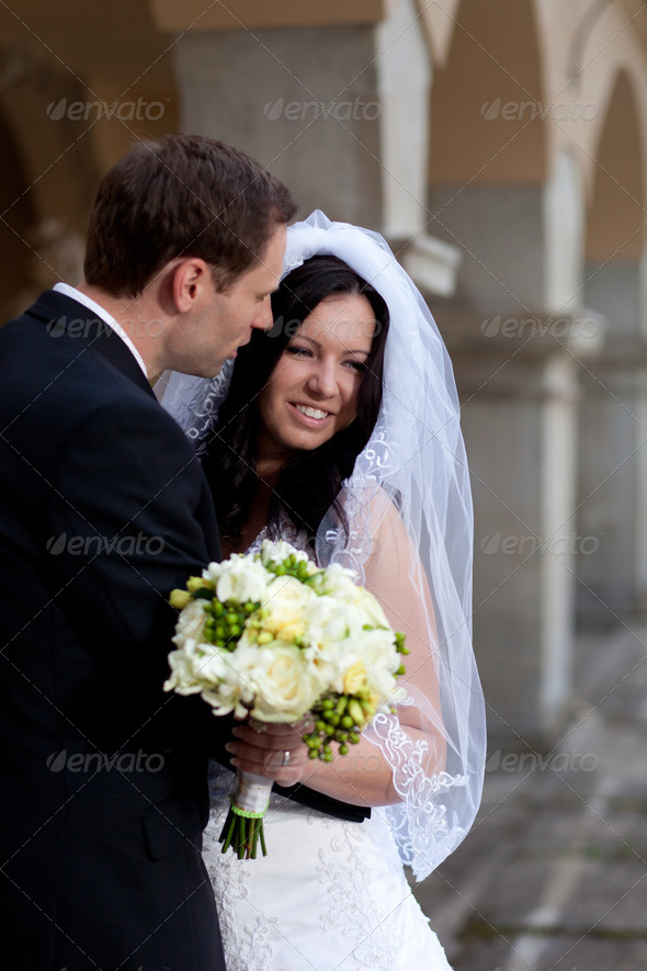 Groom Whispering in the Brides Ear