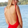 Red girl in blonde swimsuit