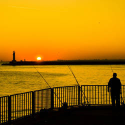 Fisherman at the sunset