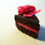 Chocolate Cake Charm With a Pink Bow