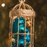Gold birdcage ornament stock