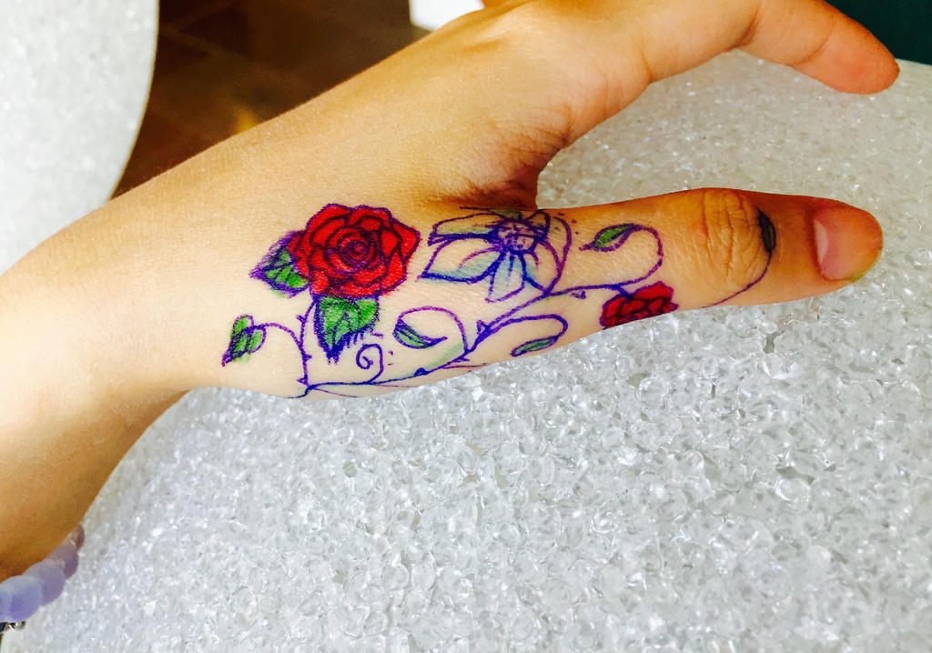 Hand Flower Tattoo