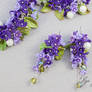 Jewelry set with lilac flowers from polymer clay