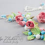 Set jewelry with roses made of polymer clay