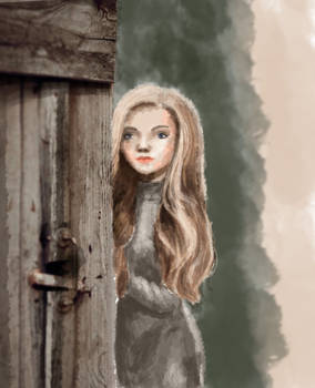 Little girl peeking behind a door