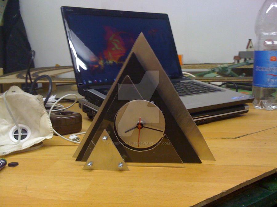 Triangle clock by TigerAngelus on DeviantArt
