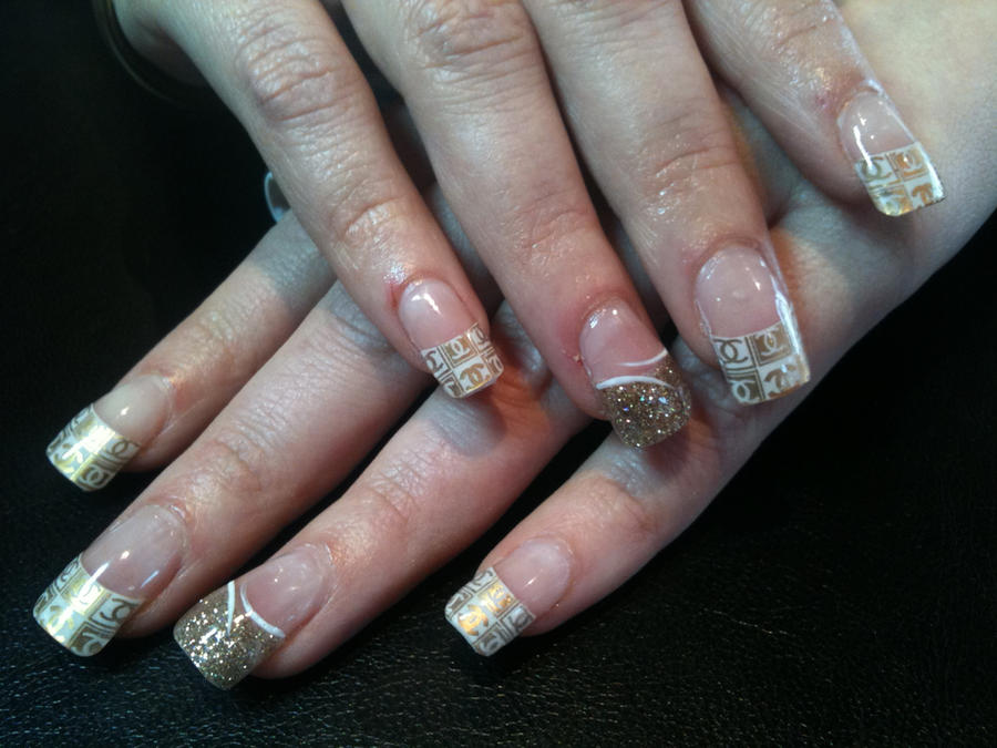 Gold Chanel nails