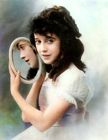 Mabel Normand with round mirror (1918)