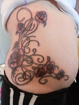 Kelly's roses her first tattoo