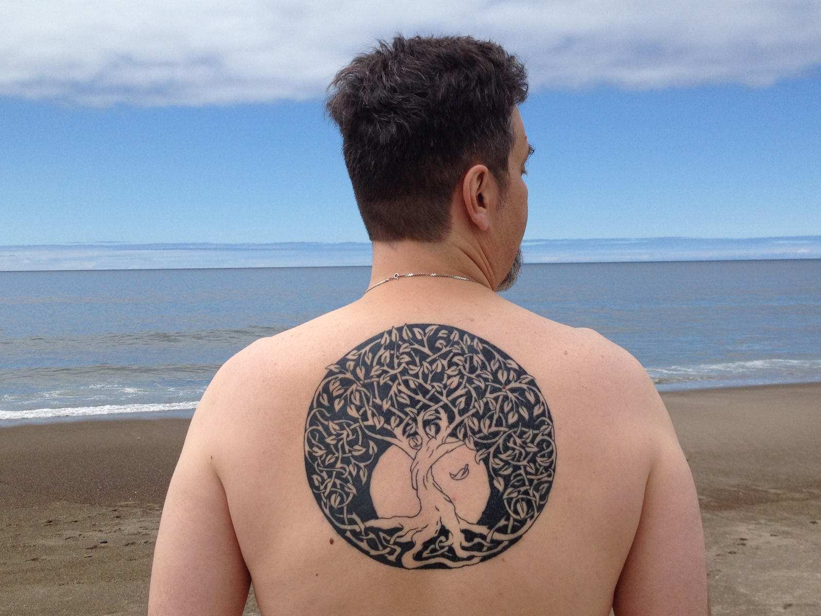 Back Tattoos That Celebrate Life’s Roots