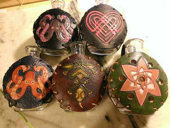 Hand Tooled Leather Bound Bottles