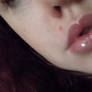 glossed lips.