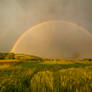 Double rainbow and Slovenian rural landscape