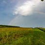 Double rainbow and Slovenian rural landscape