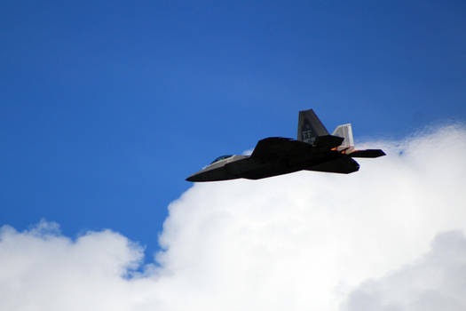 Cutting Clouds, F-22 Flyby.