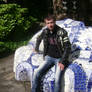 A stoned armchair painted in Delft blue colour