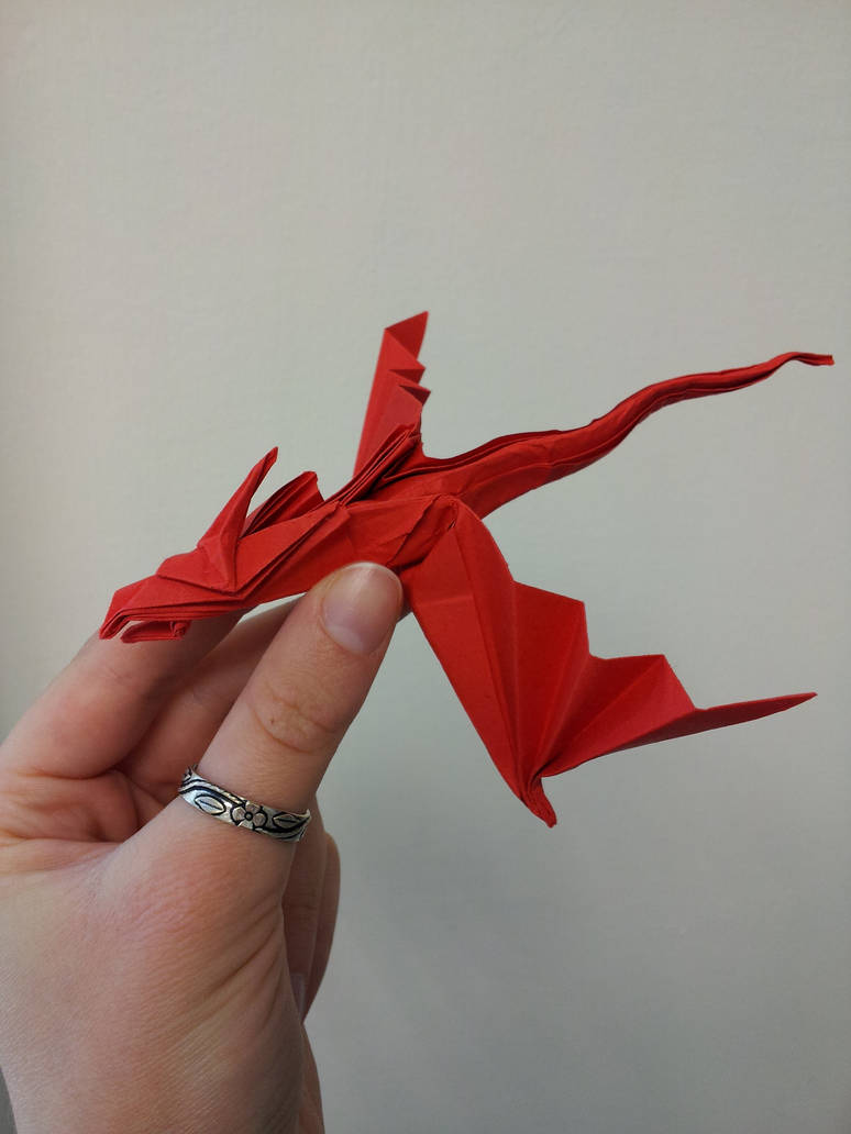 Драконы из бумаги поэтапно. Оригами. Бумажные драконы. Поделка дракон. Бумажные драконы на руку.